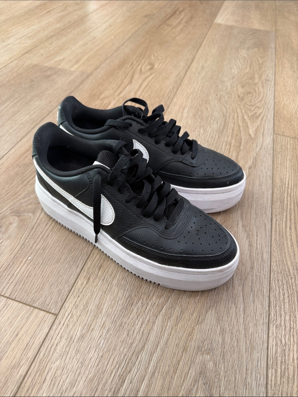 Nike Women’s Black and White Platform Sneakers